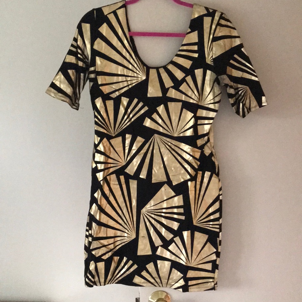 BeBe black and gold foil dress. Bodycon style.